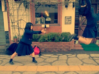 Illustration for article titled Latest Japanese Schoolgirl Trend: Fake Dragon Ball Attacks